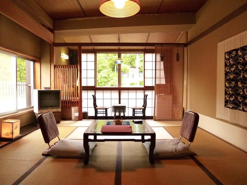 Sumiyosiya Ryokan Нодзаваонсен Номер фото